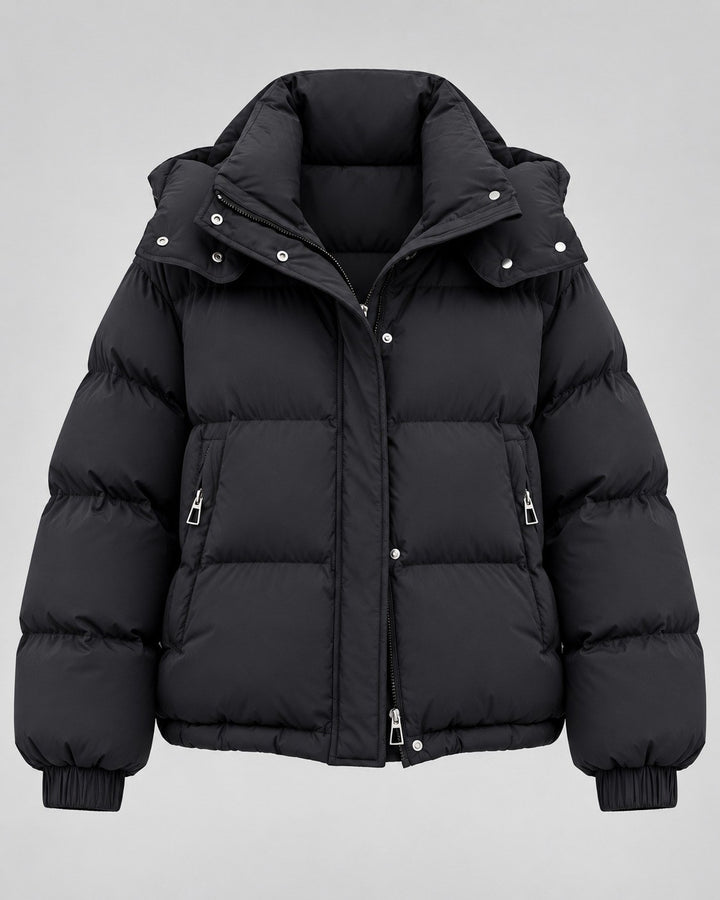 Barbara — Lässige Oversize Winterjacke für Damen mit Kapuze und Daunen, Das Modehaus Luzern