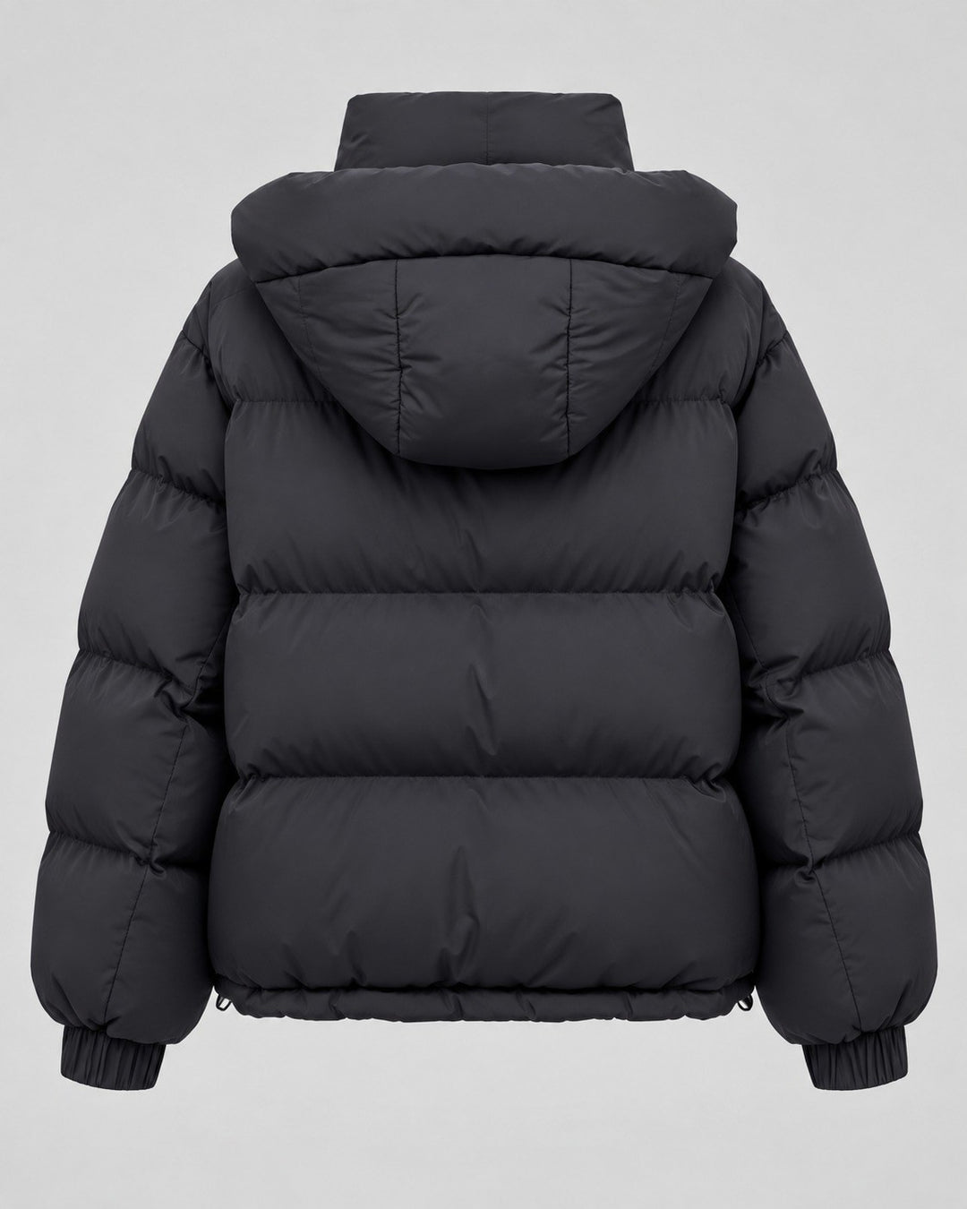 Barbara — Lässige Oversize Winterjacke für Damen mit Kapuze und Daunen, Das Modehaus Luzern