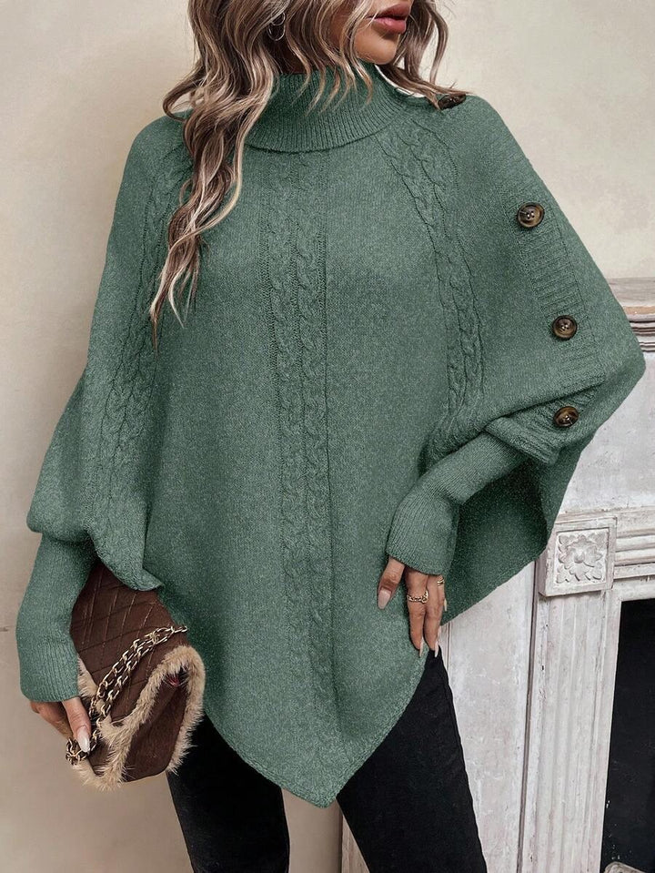 Carola — Weicher Poncho-Pullover für Damen mit Rollkragen und Zopfmuster, Das Modehaus Luzern