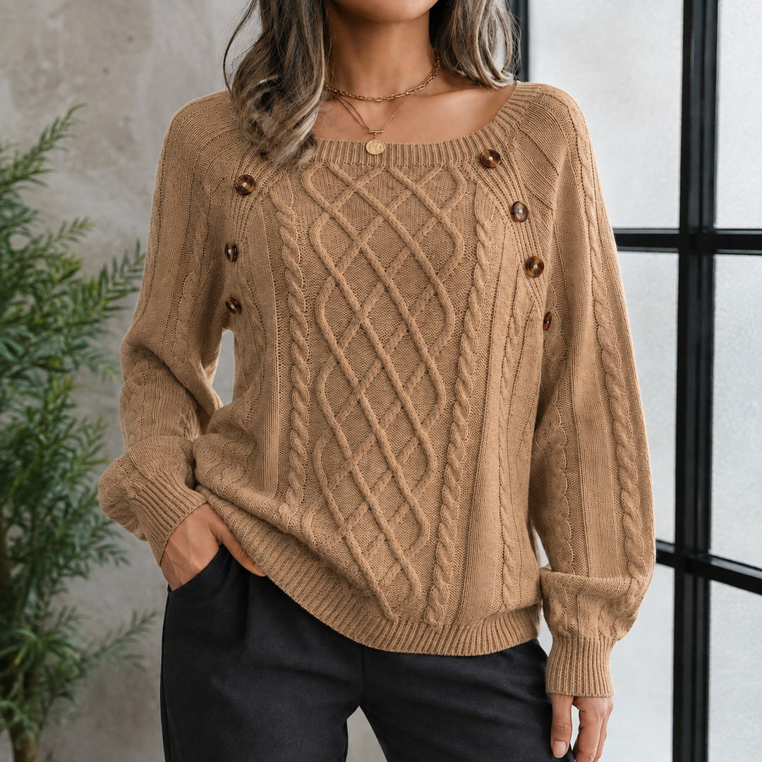 Elsa — Weicher lockerer Strickpullover für Damen mit Zopfmuster und Knöpfen, Das Modehaus Luzern