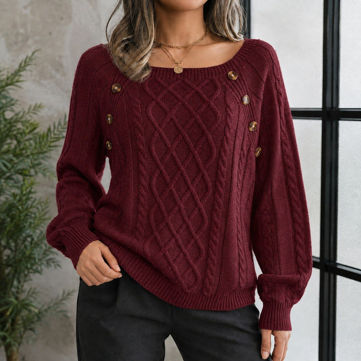 Elsa — Weicher lockerer Strickpullover für Damen mit Zopfmuster und Knöpfen, Das Modehaus Luzern