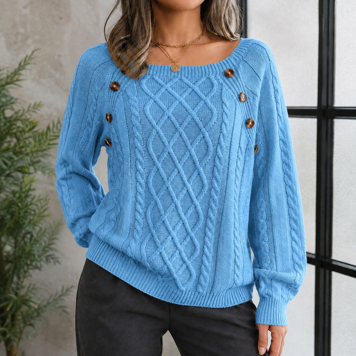 Elsa — Weicher lockerer Strickpullover für Damen mit Zopfmuster und Knöpfen, Das Modehaus Luzern