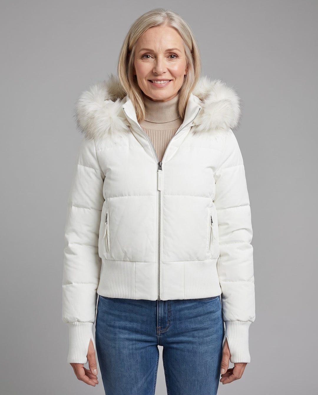 Frieda — Gesteppte Winterjacke mit Kunstfell-Kapuze und Bündchen für Damen, Das Modehaus Luzern