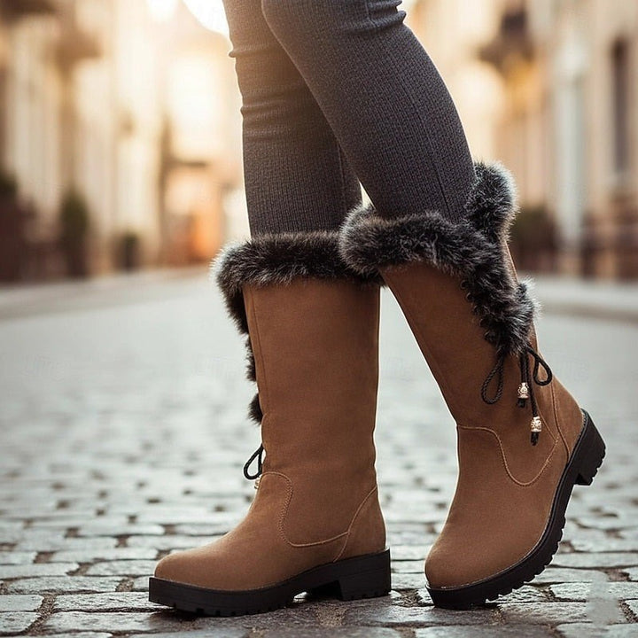 Helga — Kniehohe Winterstiefel für Damen mit Kunstfell und Profilsohle, Das Modehaus Luzern