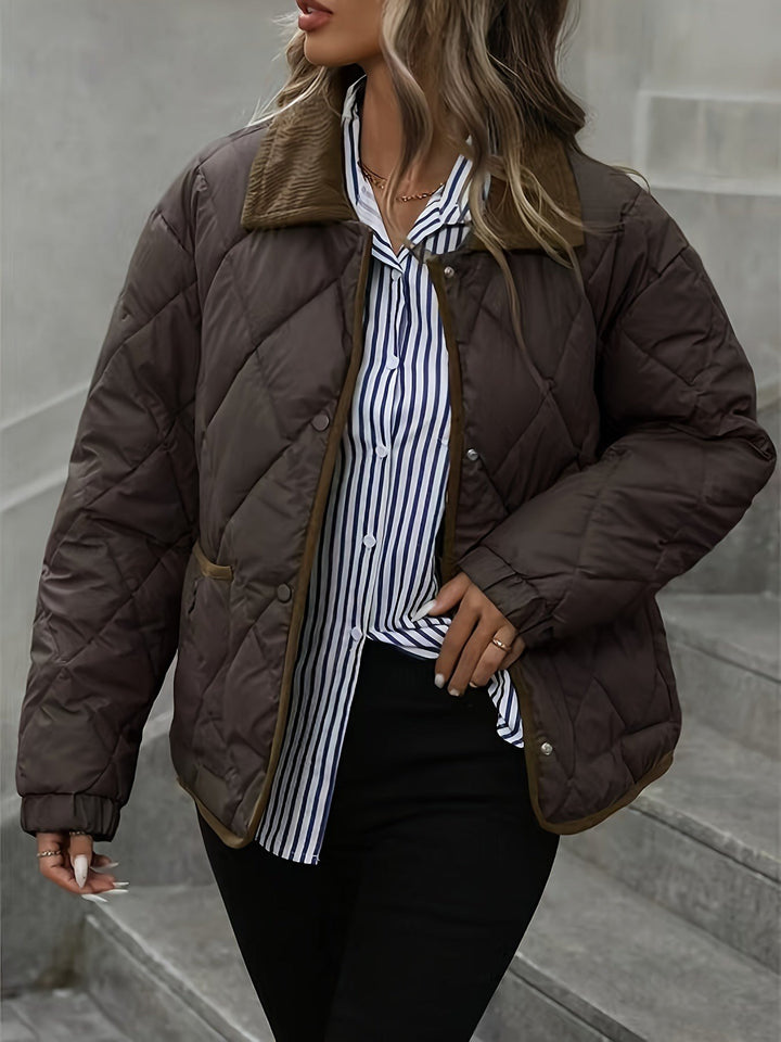 Karin — Warme gesteppte Winterjacke für Damen mit Kragen aus Cord, Das Modehaus Luzern
