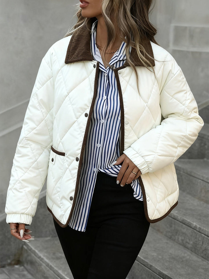 Karin — Warme gesteppte Winterjacke für Damen mit Kragen aus Cord, Das Modehaus Luzern