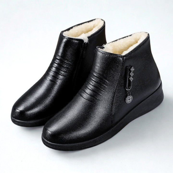Lotti — Flache gefütterte Winterschuhe in Lederoptik für Damen, Das Modehaus Luzern