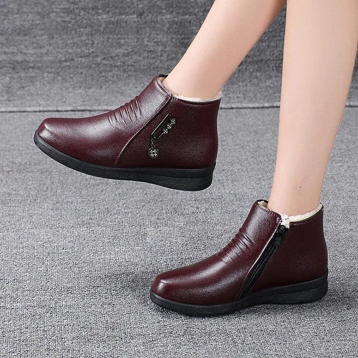 Lotti — Flache gefütterte Winterschuhe in Lederoptik für Damen, Das Modehaus Luzern