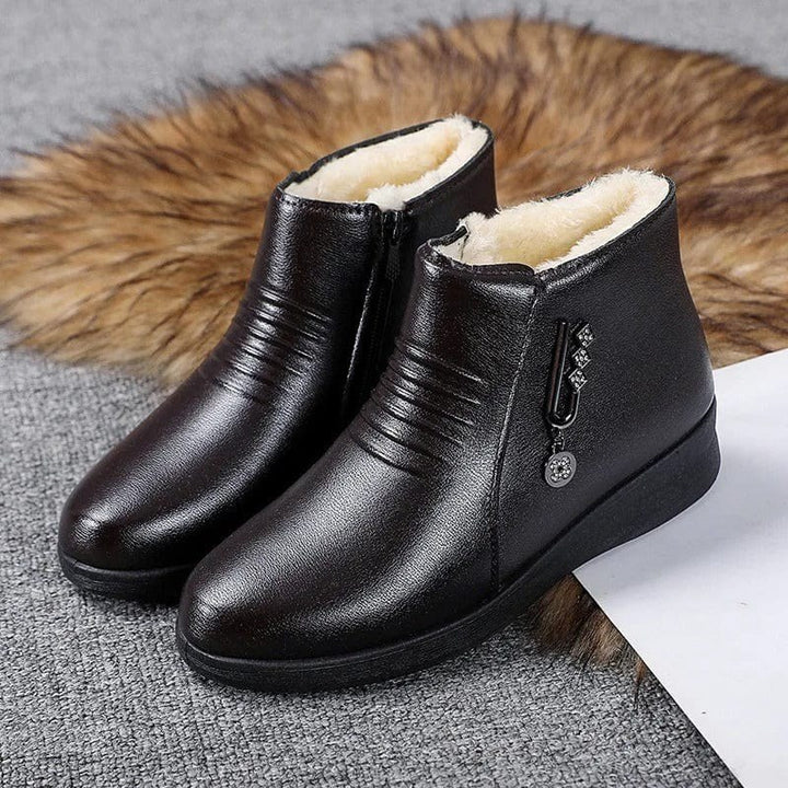 Lotti — Flache gefütterte Winterschuhe in Lederoptik für Damen, Das Modehaus Luzern