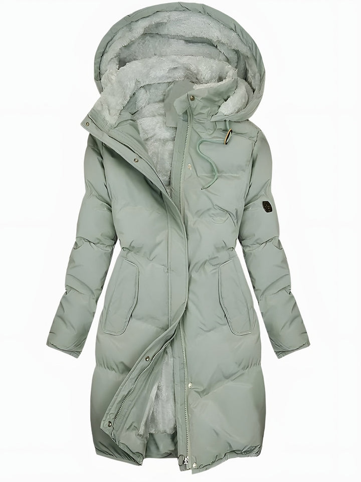 Renata — Langer wattierter Wintermantel mit Kunstfell-Kapuze für Damen, Das Modehaus Luzern