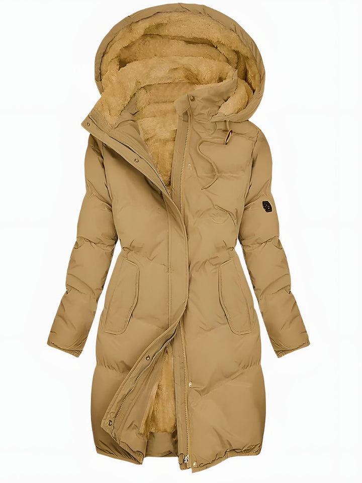 Renata — Langer wattierter Wintermantel mit Kunstfell-Kapuze für Damen, Das Modehaus Luzern
