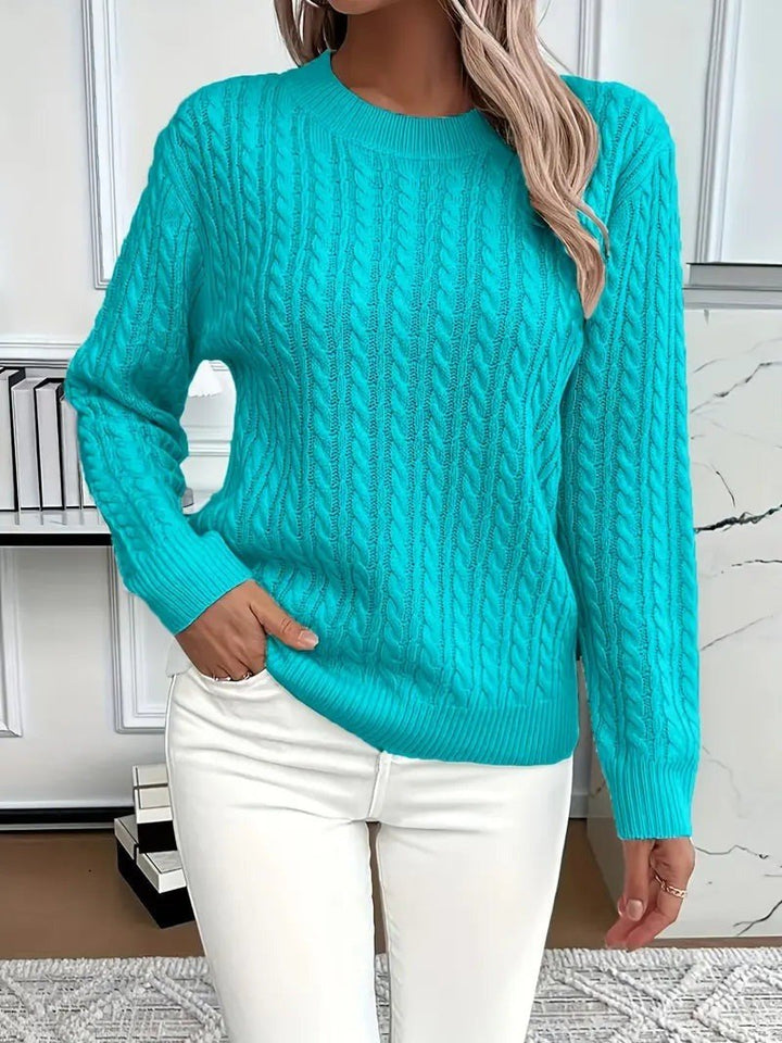 Sabrina — Klassischer Strickpullover für Damen mit Zopfmuster und Bündchen, Das Modehaus Luzern