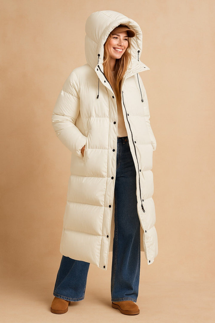 Sandra — Warme lange wattierte Winterjacke für Damen mit Kapuze, Das Modehaus Luzern