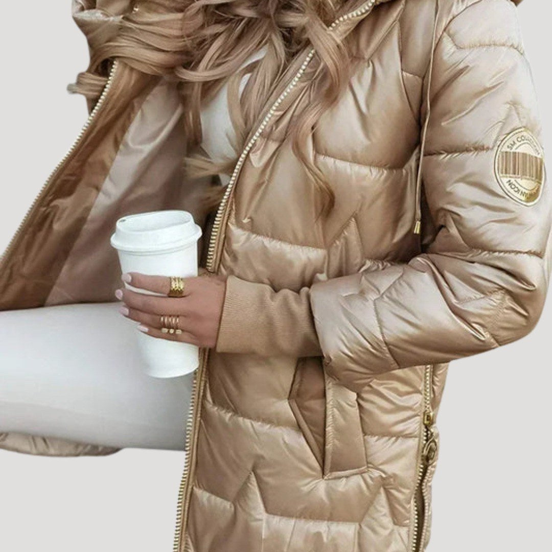 Seline — Daunenjacke für Damen mit Kapuze und durchgehendem Reissverschluss, Das Modehaus Luzern