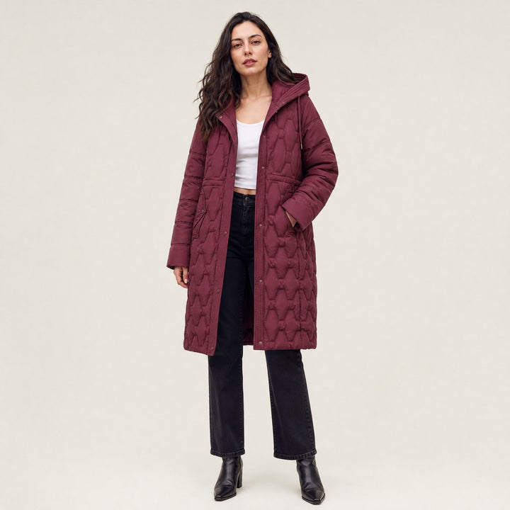 Sina — Gesteppter wattierter Daunenmantel für Damen mit grosser Kapuze, Das Modehaus Luzern