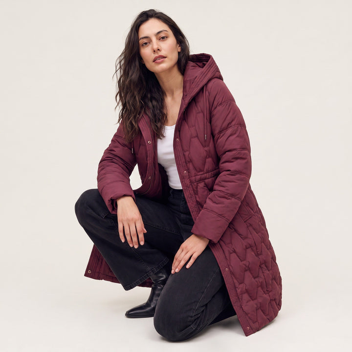Sina — Gesteppter wattierter Daunenmantel für Damen mit grosser Kapuze, Das Modehaus Luzern