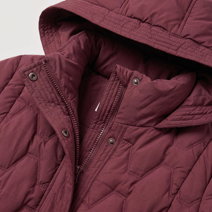 Sina — Gesteppter wattierter Daunenmantel für Damen mit grosser Kapuze, Das Modehaus Luzern